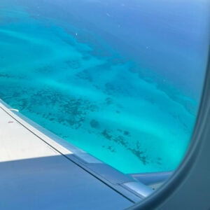 view of open sea from an aircraft window - fear of flying over water