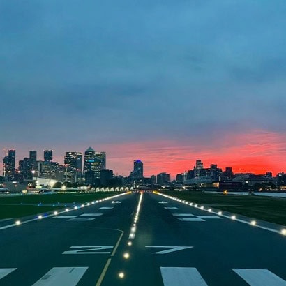 lit runway stretches into the distance - runway anxiety